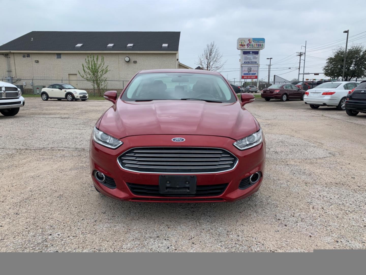2015 Maroon /Black Ford Fusion SE (3FA6P0H95FR) with an 2.0L L4 DOHC 16V engine, Automatic transmission, located at 1830 North Belt Line Road, Irving, TX, 75061, (469) 524-0199, 32.834373, -96.993584 - Photo#1